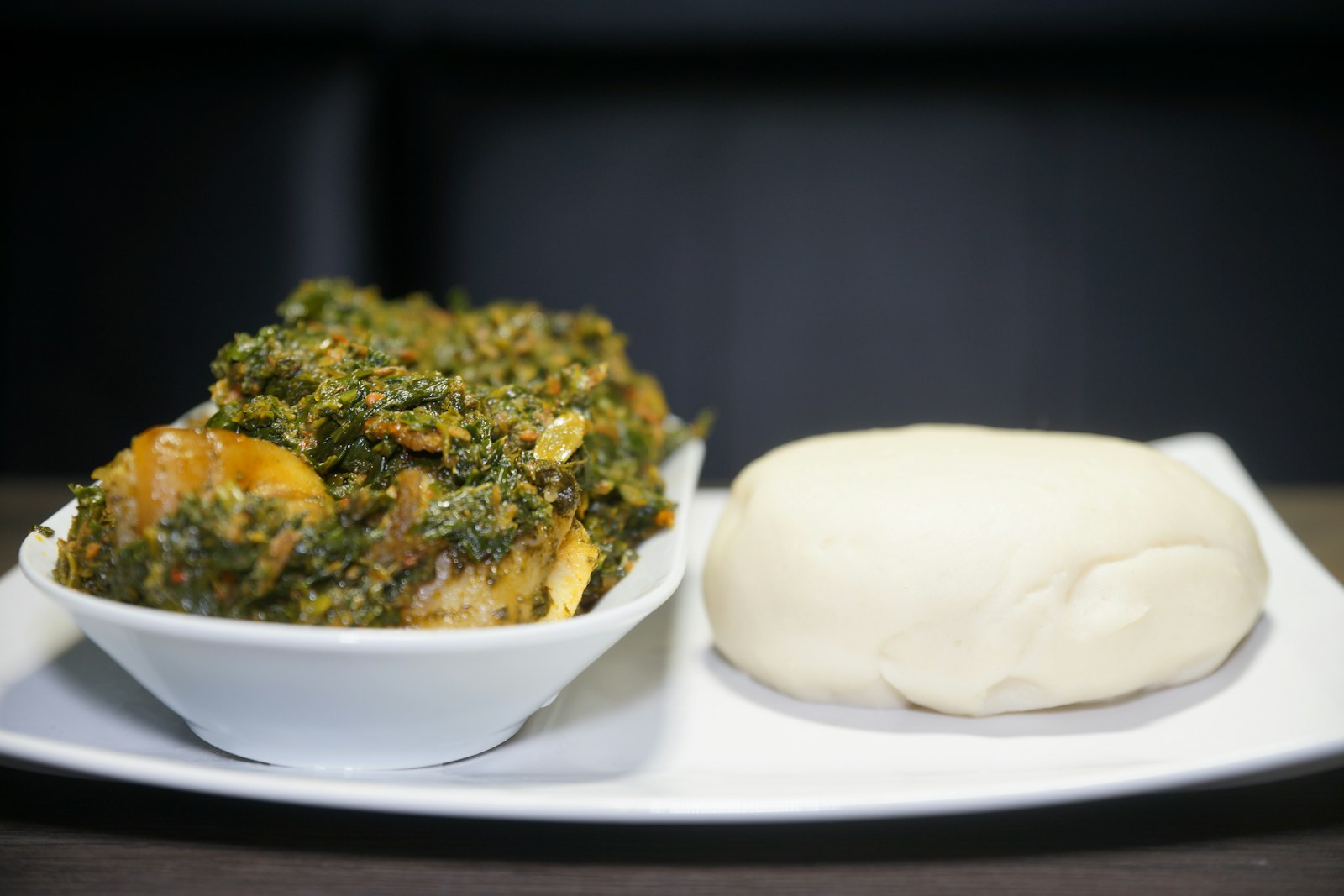 A bowl of eforiro with fufu